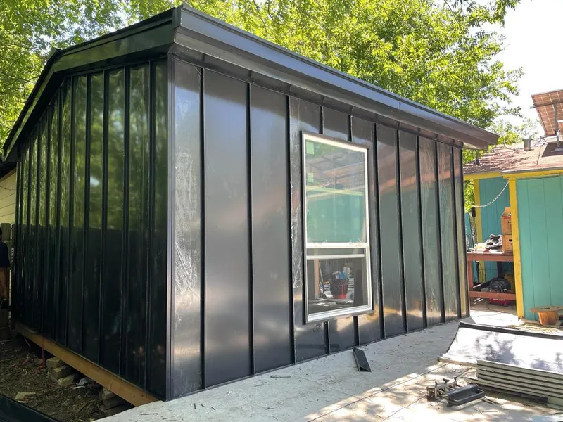Black standing seam metal wall panels for Roof Inspection in Lincoln Village
