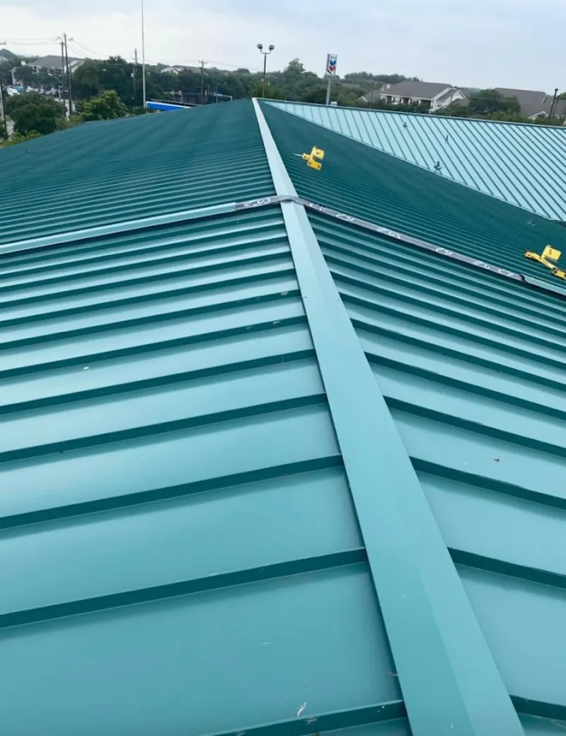 Green commercial metal roof ridge and valley for Metal Roof Repair in Lincoln Village
