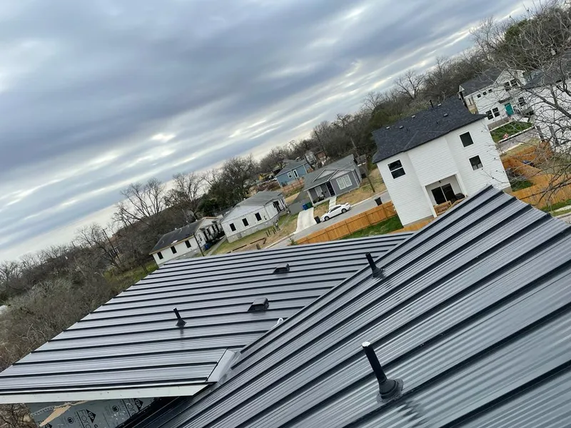 Standing seam metal roof panels with vents for Skylight Repair in Lincoln Village